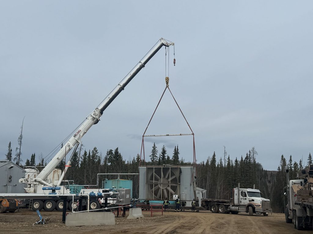 Donald Rigging’s specialized transportation crew lifts a 176,000-lb compressor to ready it for transport.
