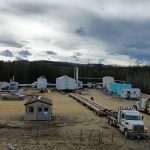 Donald Rigging trucks and trailers line up for loading.